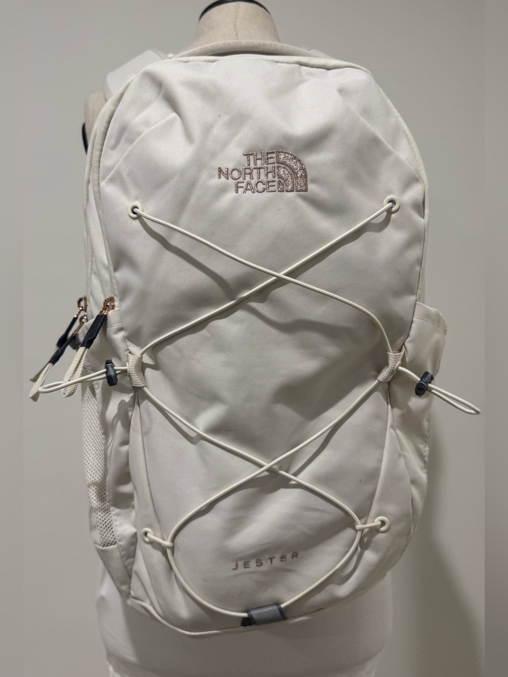 The North Face Jester Backpack in Cream with Rose Gold Accents